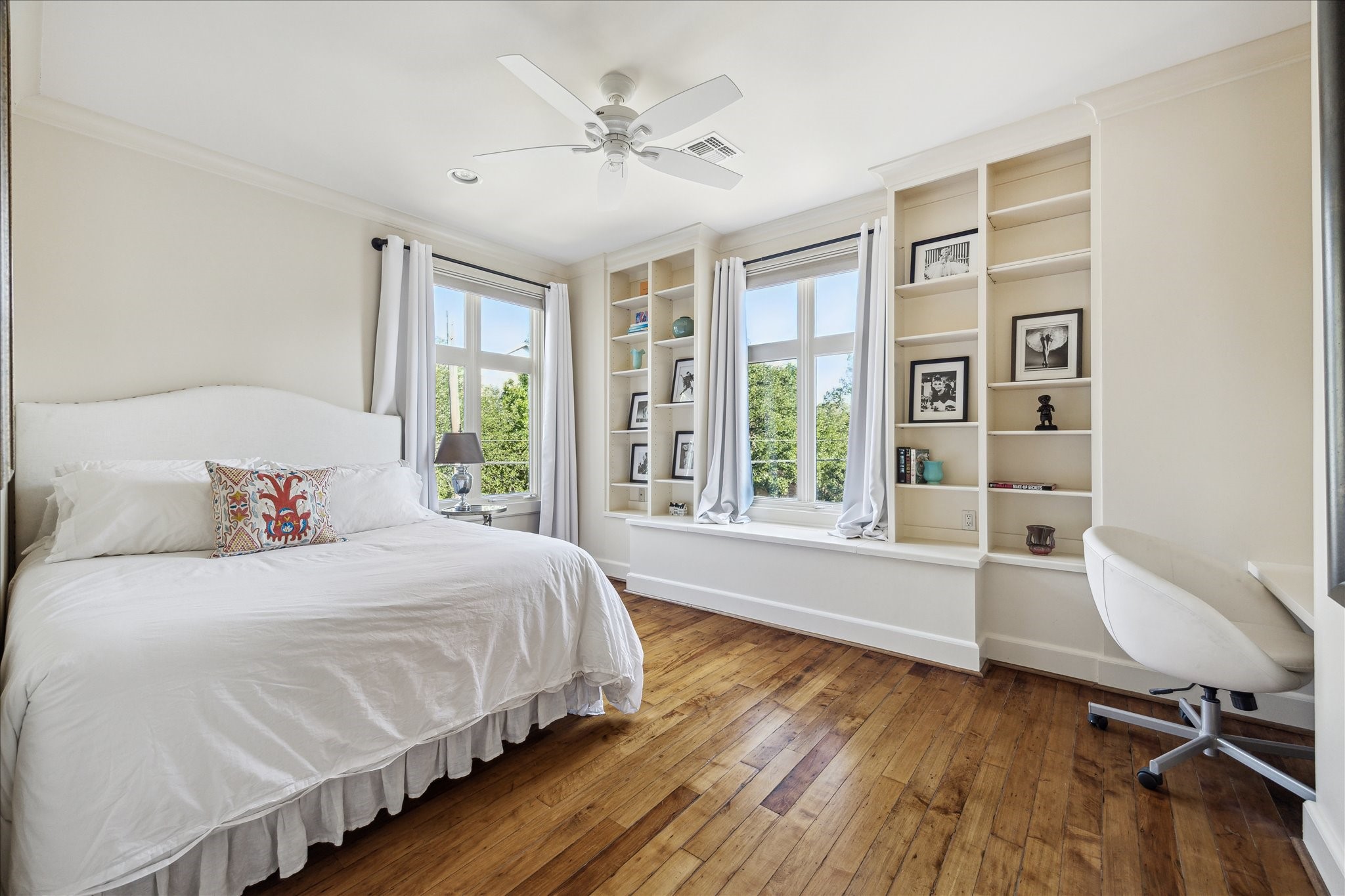 1804 Bolsover Street Houston, TX 77005 - Photo 29 of 46 a bedroom with a large bed and a window