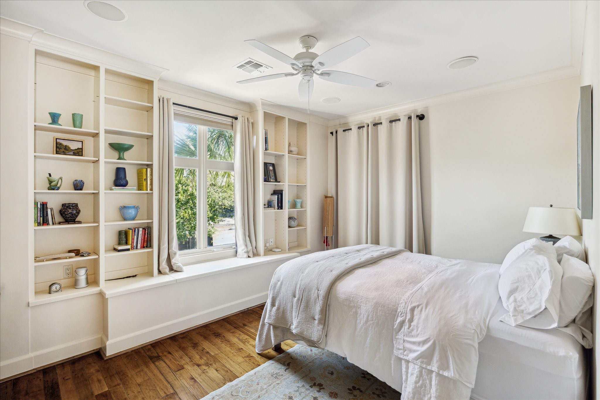 1804 Bolsover Street Houston, TX 77005 - Photo 30 of 46 a bedroom with a bed and a large window with the outer view