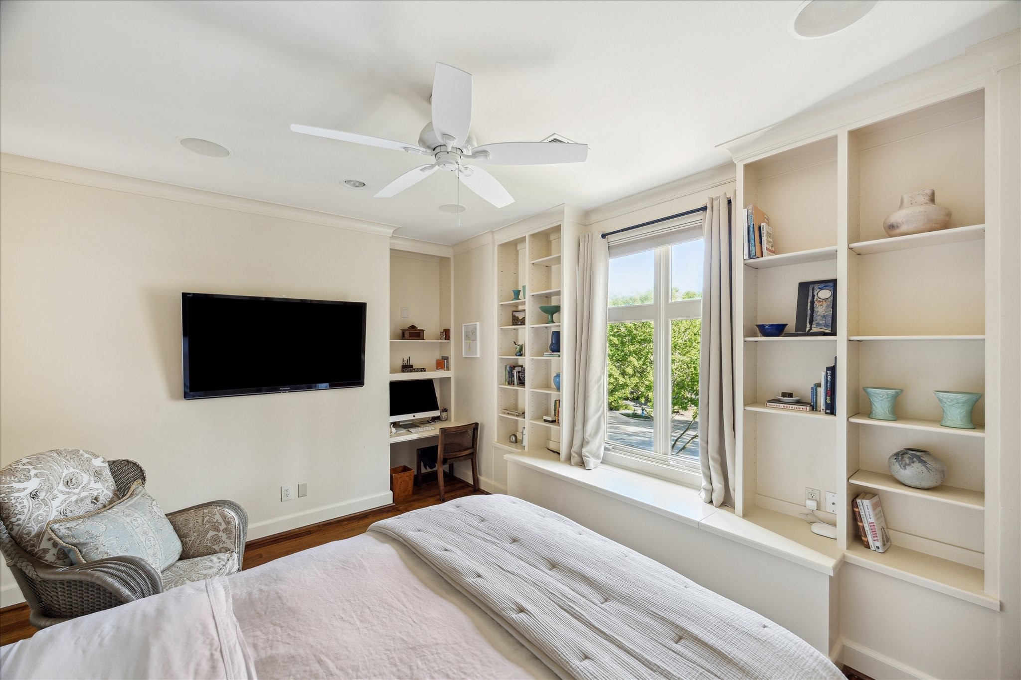 1804 Bolsover Street Houston, TX 77005 - Photo 31 of 46 a bedroom with a bed and a flat screen tv