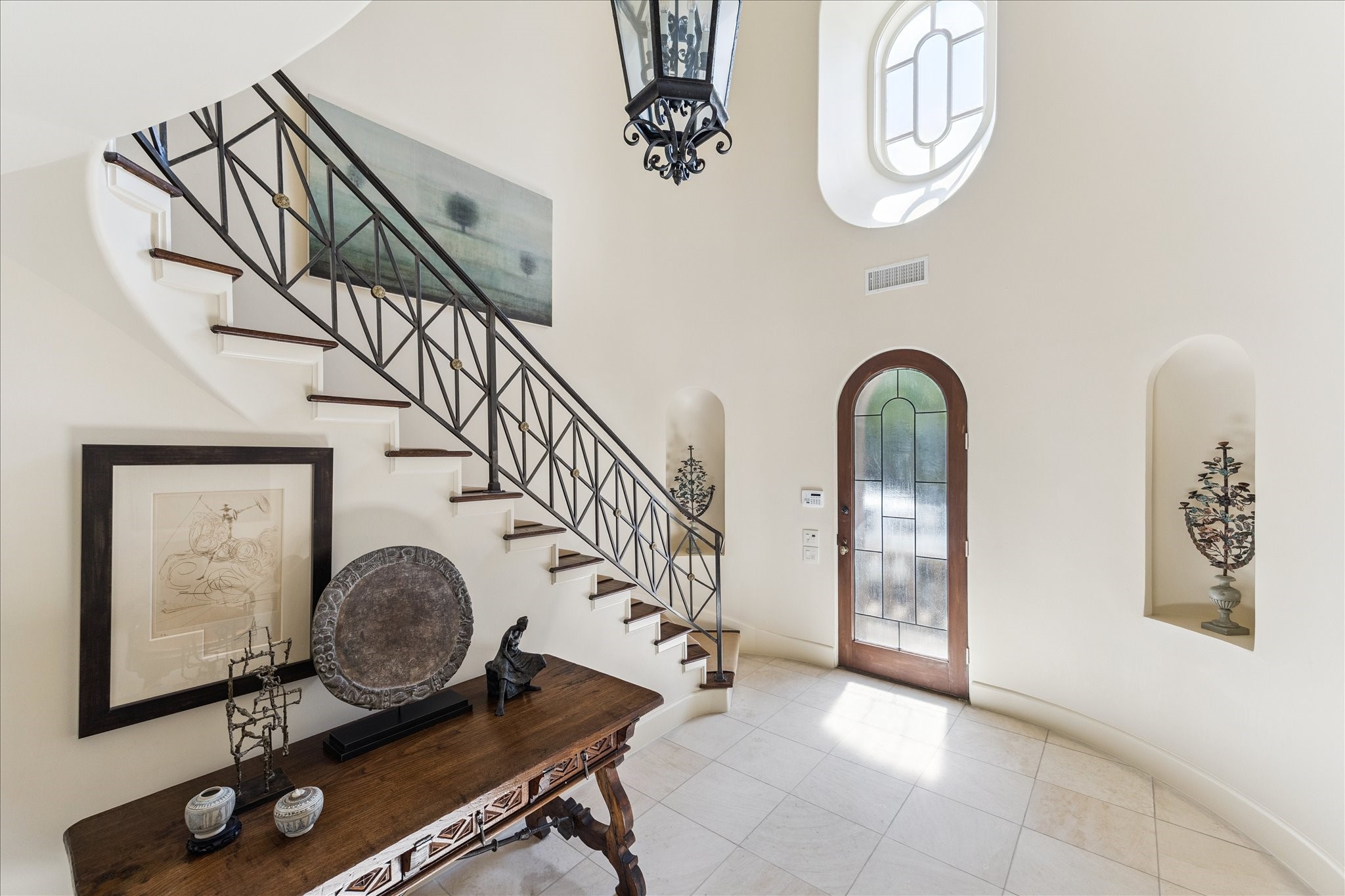 1804 Bolsover Street Houston, TX 77005 - Photo 5 of 46 Dramatic entry with high ceilings and limestone flooring.