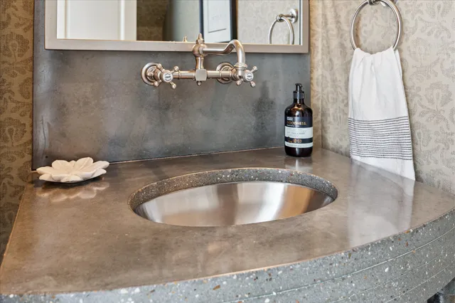 a view of a a dining room with furniture window and wooden floor