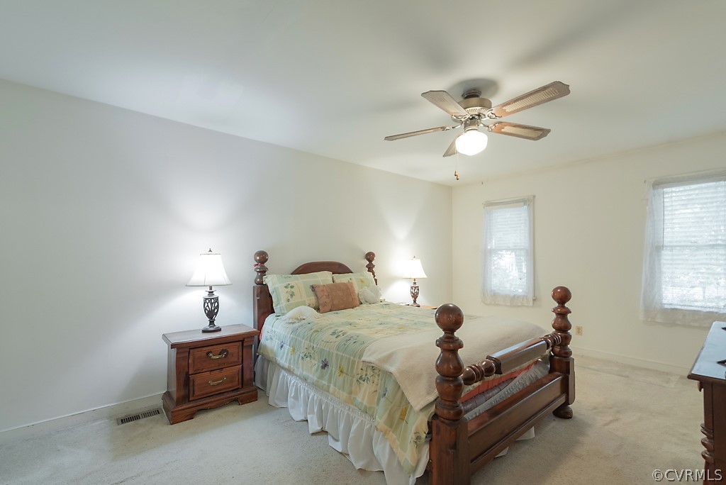 14007 Turtle Hill Road Midlothian, VA 23112 - Photo 20 of 40 a bedroom with bed and window