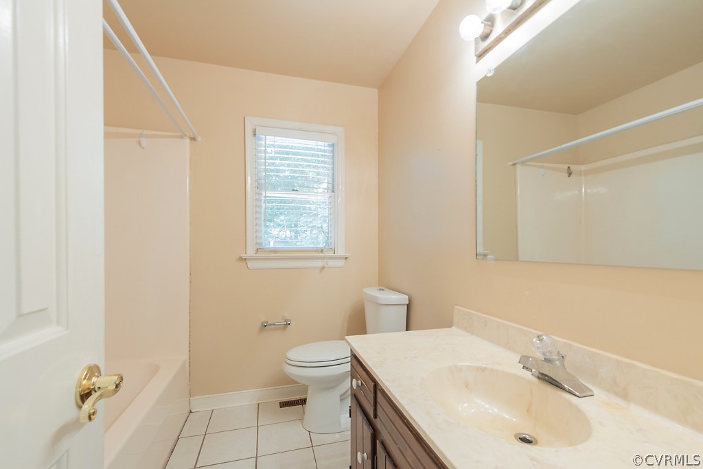 14007 Turtle Hill Road Midlothian, VA 23112 - Photo 23 of 40 a bathroom with a sink toilet and shower