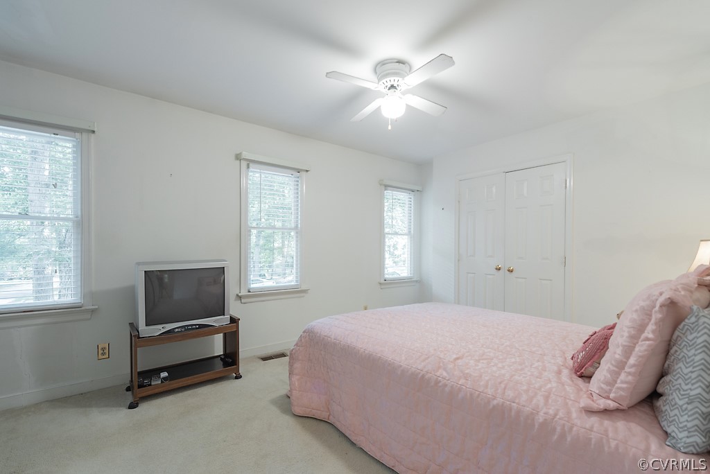 14007 Turtle Hill Road Midlothian, VA 23112 - Photo 25 of 40 a bedroom with a bed and a window