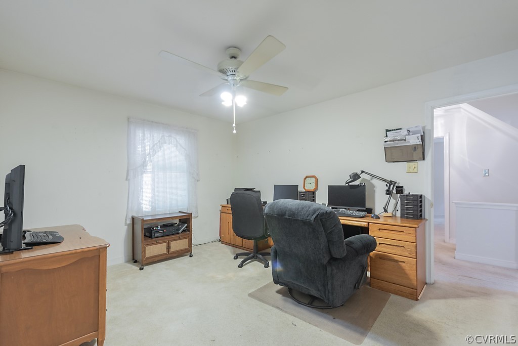 14007 Turtle Hill Road Midlothian, VA 23112 - Photo 28 of 40 a work room with furniture and a flat screen tv