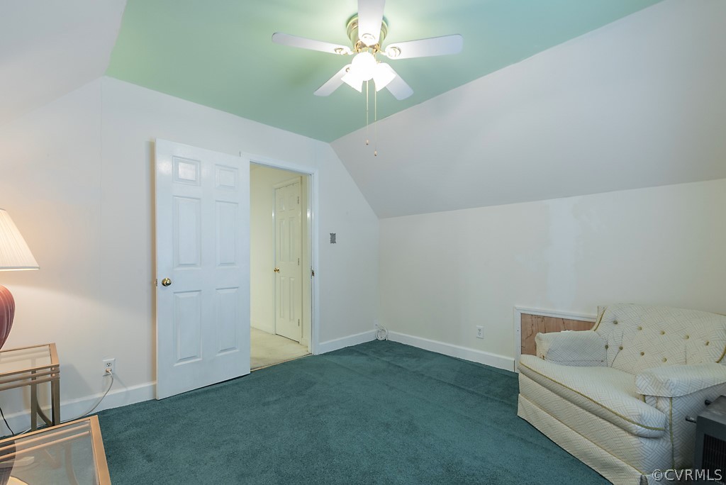 14007 Turtle Hill Road Midlothian, VA 23112 - Photo 30 of 40 a room with a bed and a chandelier fan