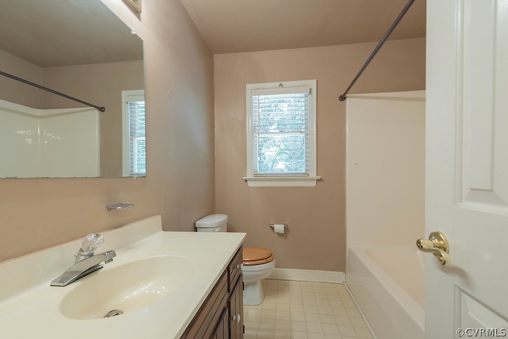 14007 Turtle Hill Road Midlothian, VA 23112 - Photo 31 of 40 a bathroom with a sink toilet and shower