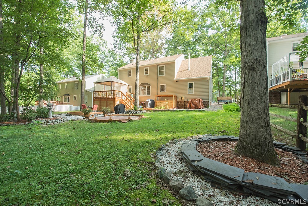 14007 Turtle Hill Road Midlothian, VA 23112 - Photo 40 of 40 a view of a house with backyard porch and sitting area