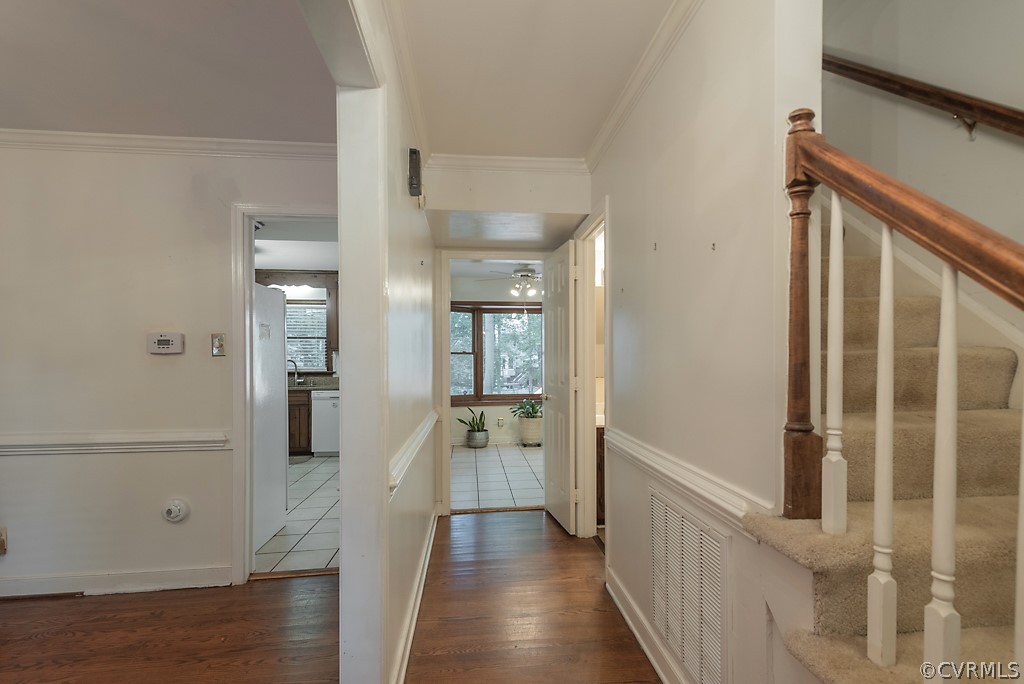 14007 Turtle Hill Road Midlothian, VA 23112 - Photo 8 of 40 a view of a hallway with wooden floor and staircase