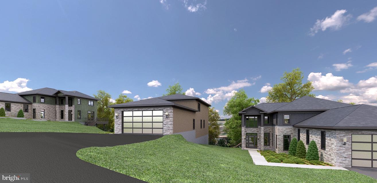 10311 Colesville Road Silver Spring, MD 20901 - Photo 2 of 4 a view of a house with a yard and potted plants