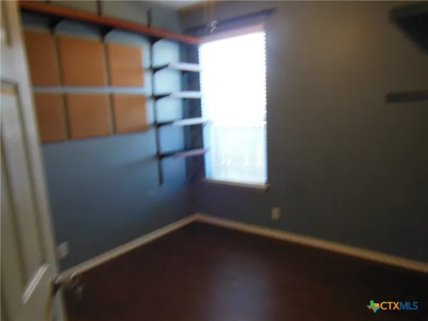 a view of a room with rack on the wall