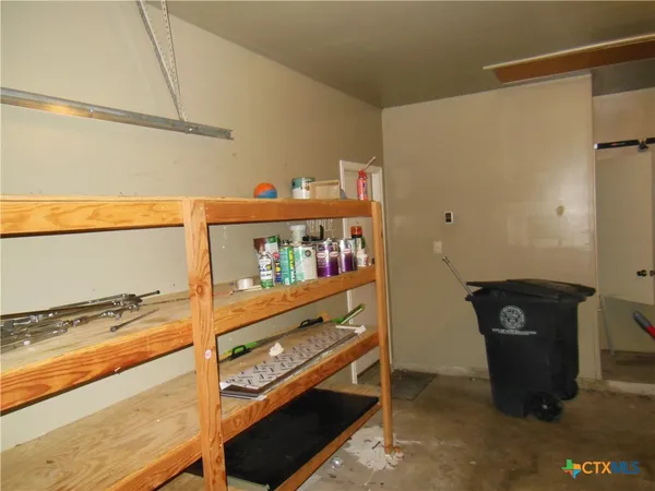 a room with storage and utility