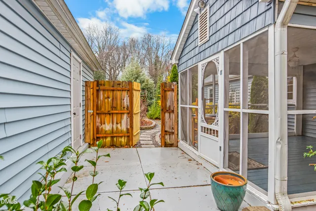 a view of a outdoor space with a door and windows