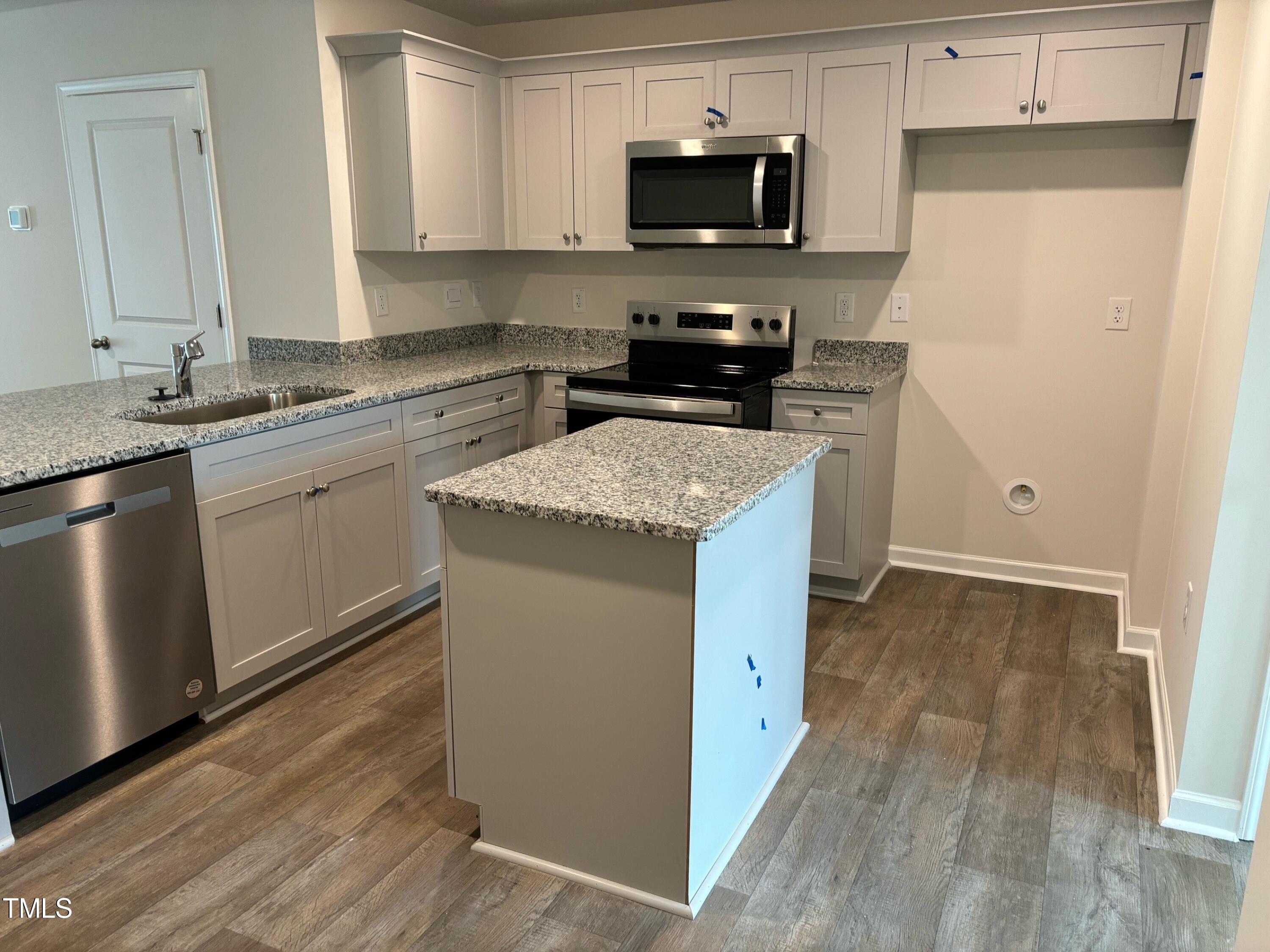 8731 Asher Gray Way Raleigh, NC 27616 - Photo 3 of 21 syd kitchen