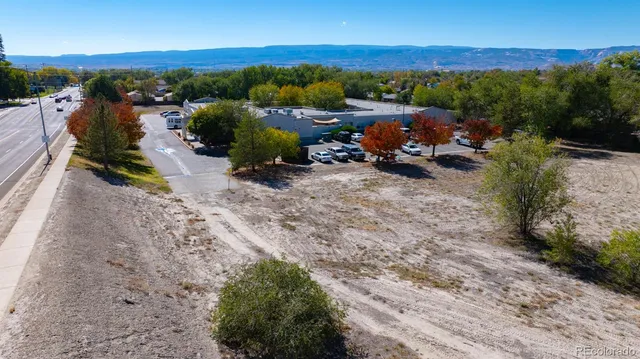 a view of backyard with green space
