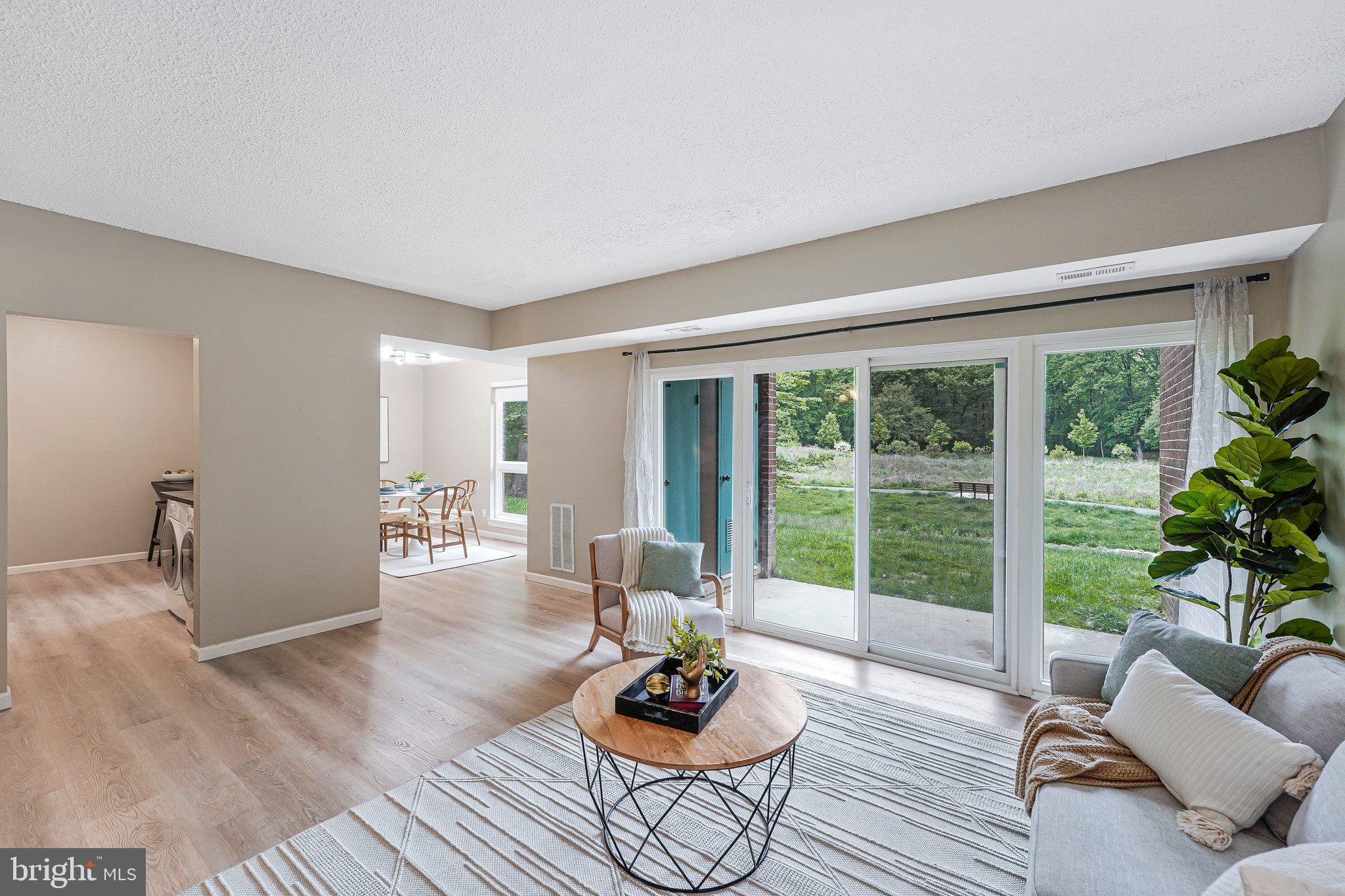 11804 Breton Court, Unit 1A Reston, VA 20191 - Photo 4 of 19 Light-Filled Living Room