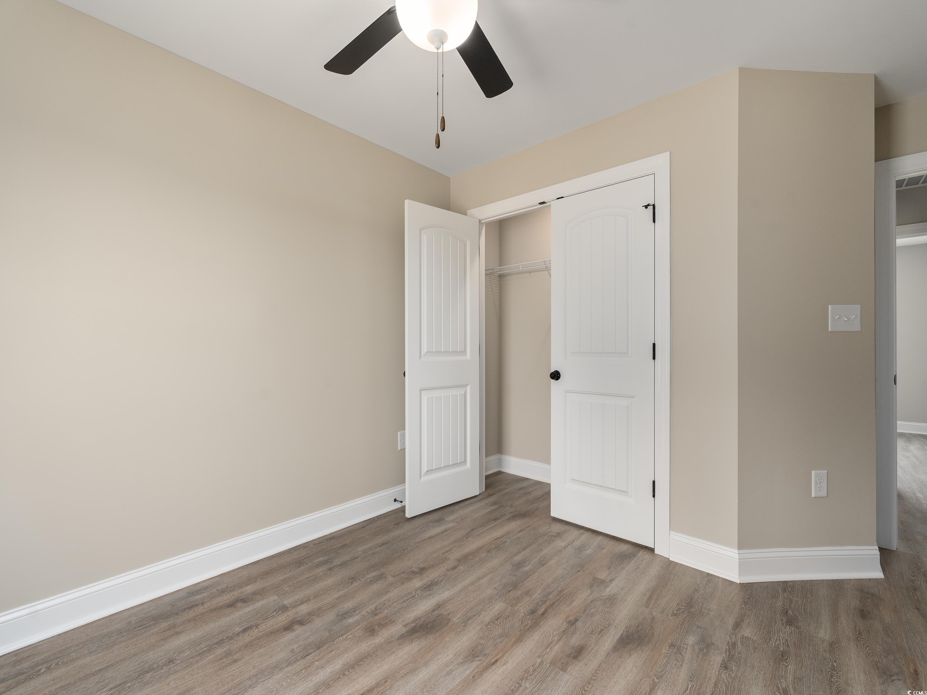 3433 B And S Road Loris, SC 29569 - Photo 23 of 27 Unfurnished bedroom featuring visible vents, a clo