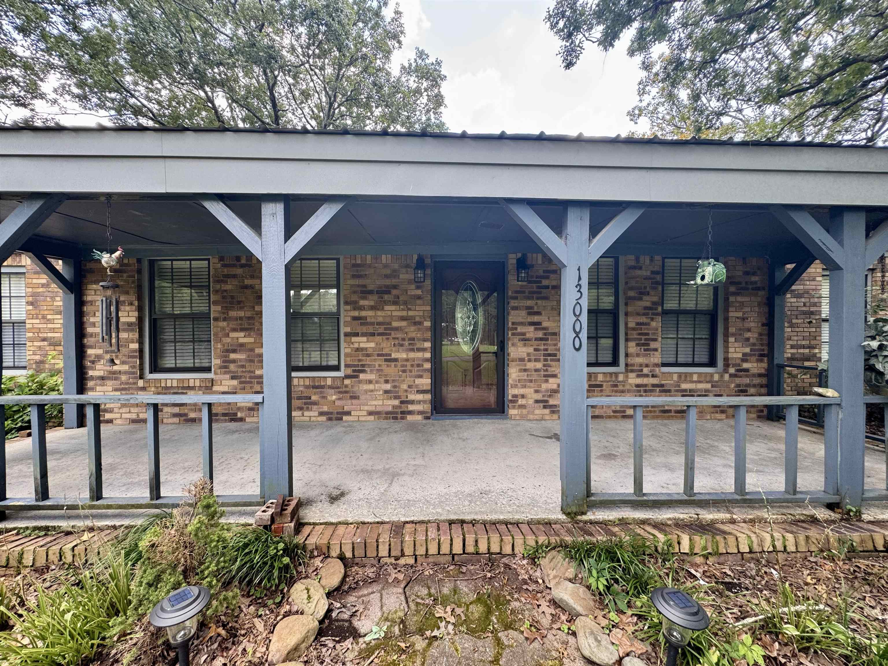 13000 Highway 57 Middleton, TN 38052 - Photo 8 of 40 front view of a house with a porch