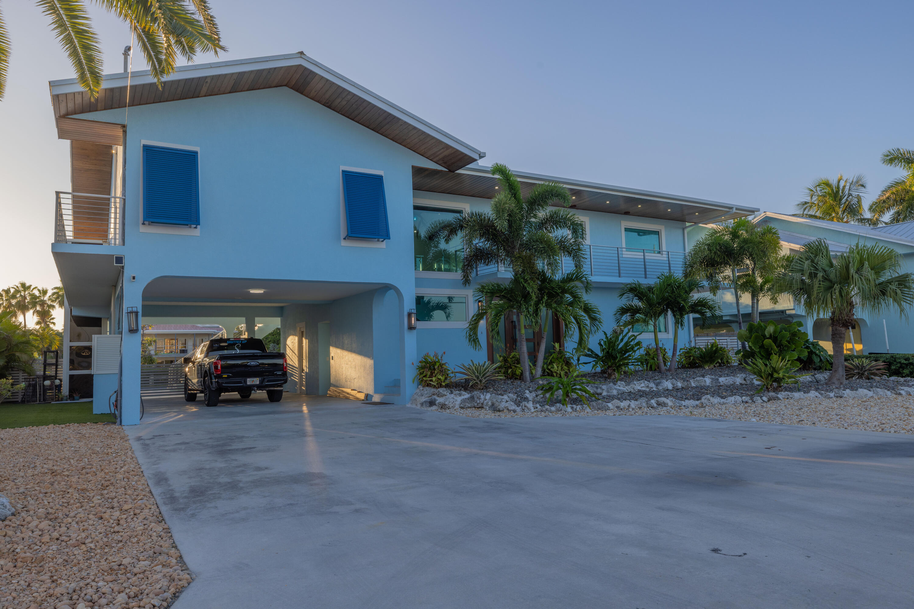 241 12th Street Key Colony Beach, FL 33051 - Photo 60 of 74 a view of a house with a yard and sitting area