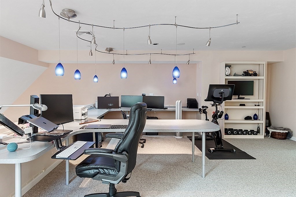 47 Deer Path, Unit 47 Hudson, MA 01749 - Photo 20 of 42 a view of a workspace with furniture