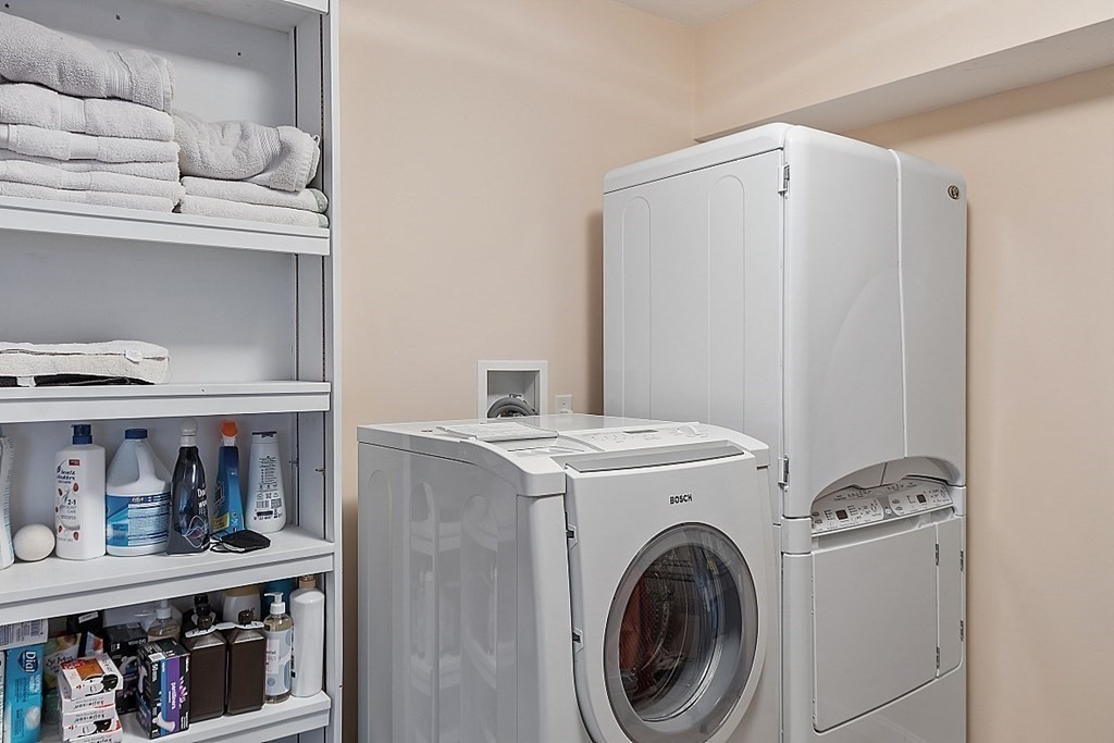 47 Deer Path, Unit 47 Hudson, MA 01749 - Photo 22 of 42 a utility room with dryer and washer