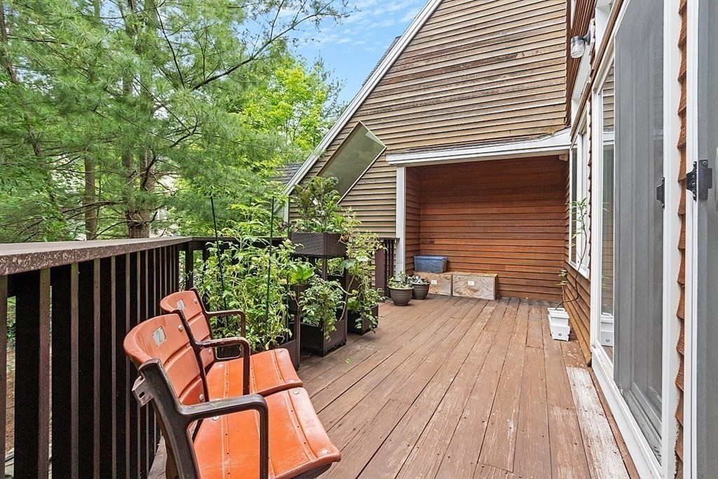 47 Deer Path, Unit 47 Hudson, MA 01749 - Photo 33 of 42 a view of a balcony with chairs
