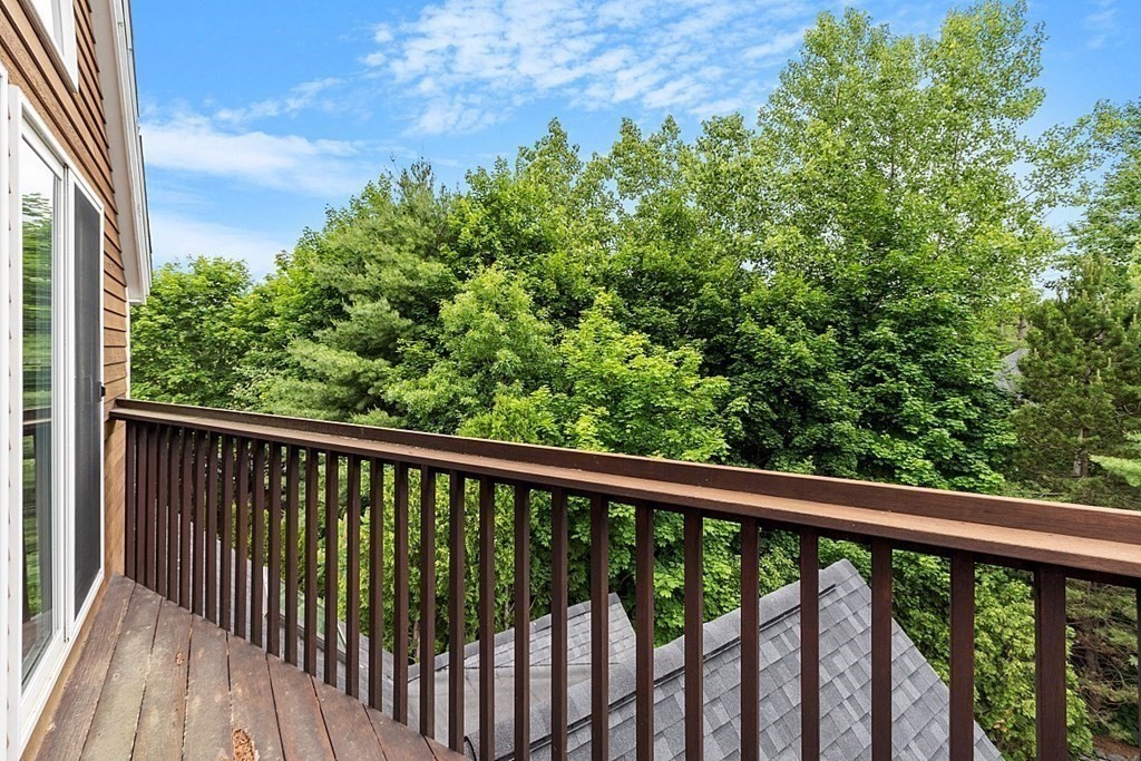 47 Deer Path, Unit 47 Hudson, MA 01749 - Photo 34 of 42 a view of a balcony with outdoor space