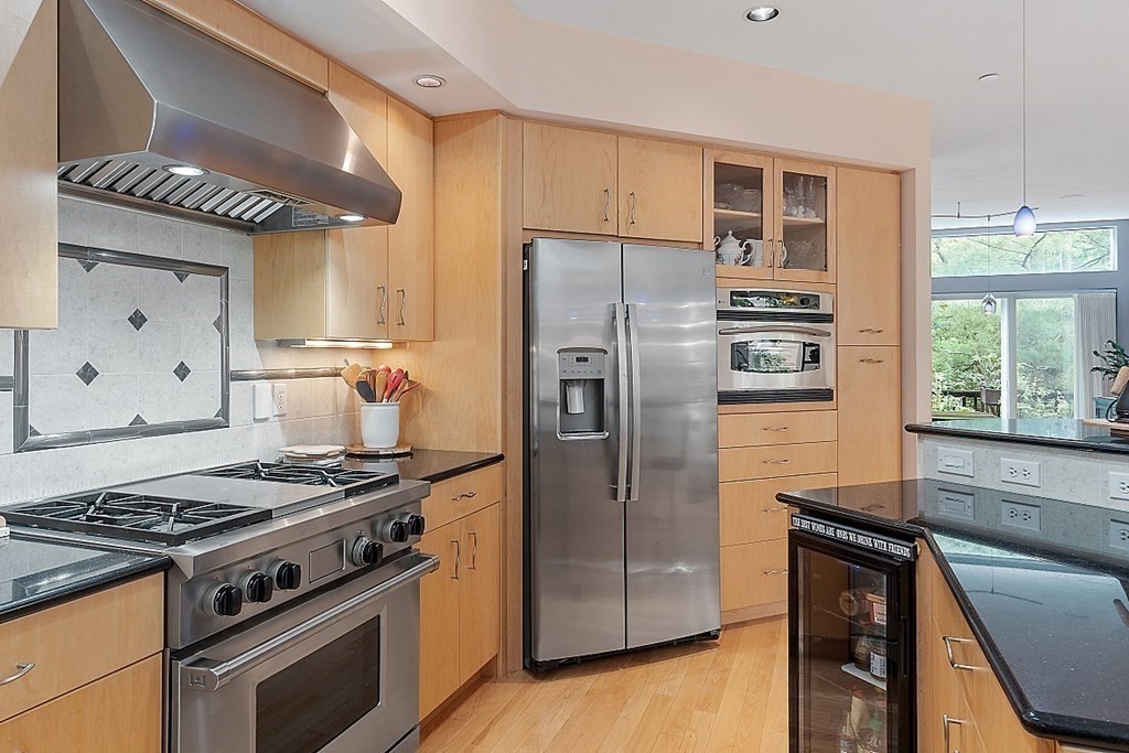 47 Deer Path, Unit 47 Hudson, MA 01749 - Photo 6 of 42 a kitchen with a stove and a refrigerator