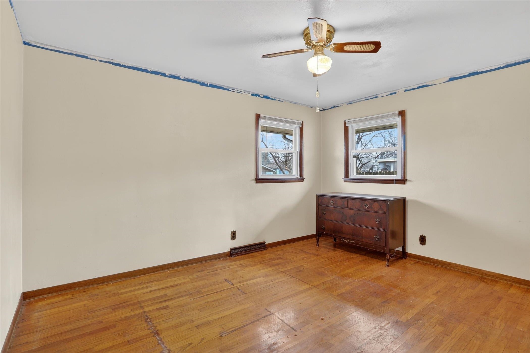 6962 Ralph Road Rockford, IL 61109 - Photo 15 of 35 a view of a livingroom with a ceiling fan and window