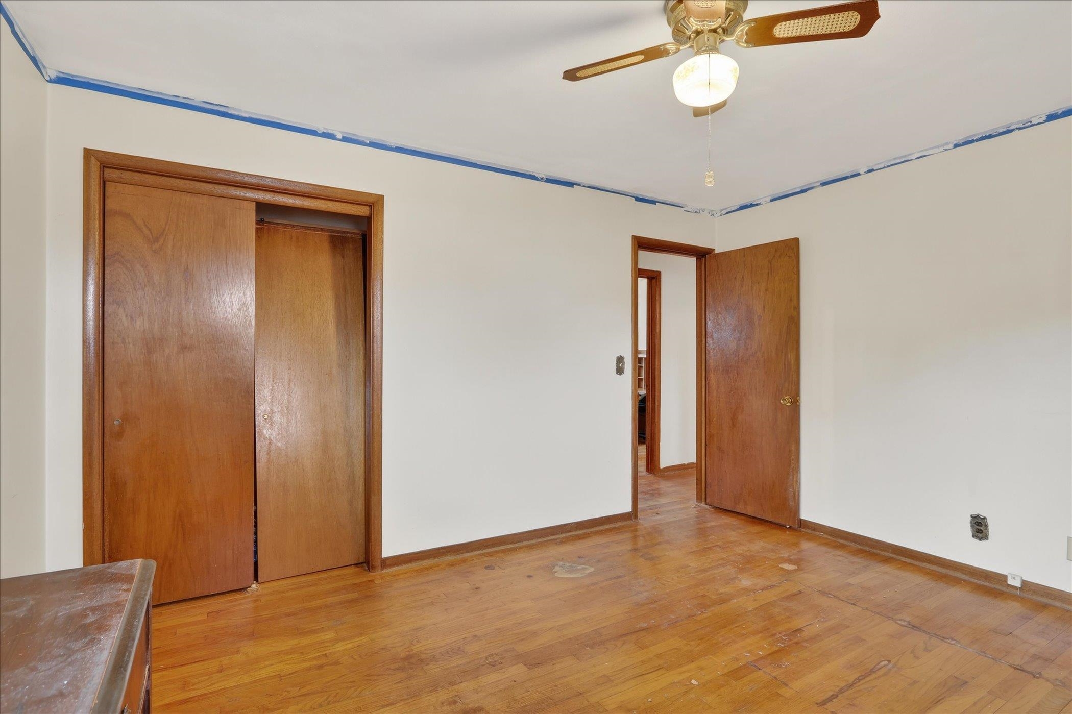 6962 Ralph Road Rockford, IL 61109 - Photo 16 of 35 a view of an empty room with a chandelier