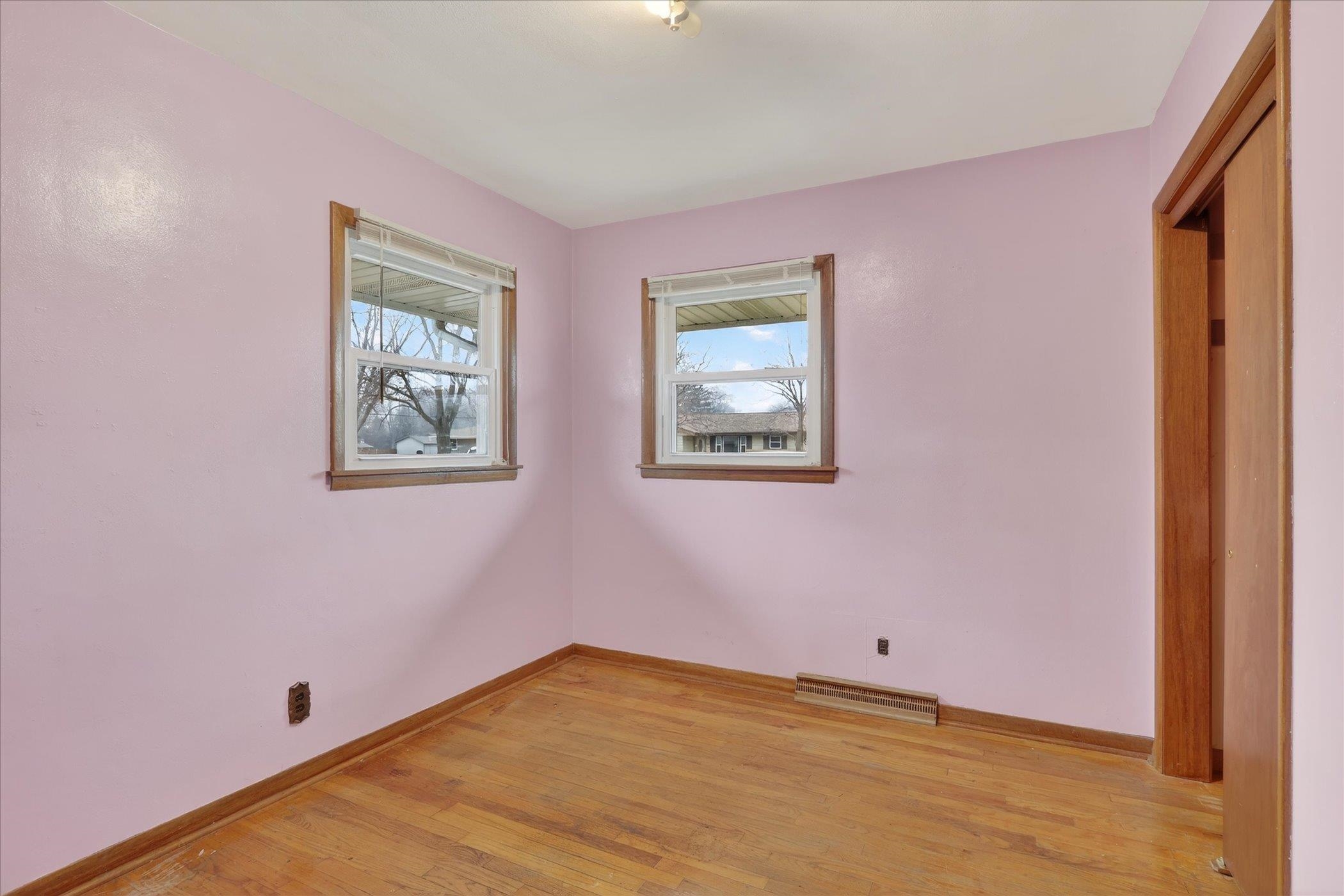 6962 Ralph Road Rockford, IL 61109 - Photo 17 of 35 a view of empty room with wooden floor and fan