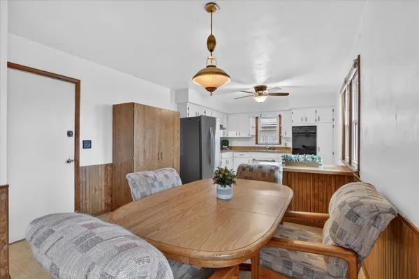 a view of a dining room with furniture