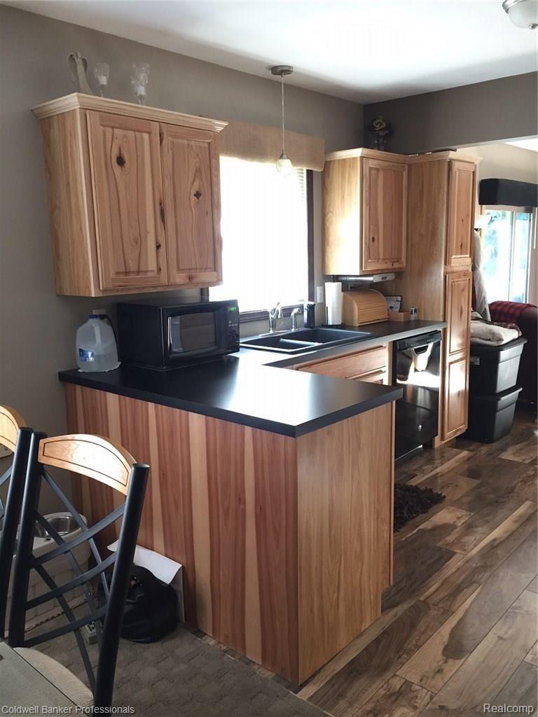 5075 North Georgetown Road Grand Blanc, MI 48439 - Photo 9 of 26 Hickory cabinets