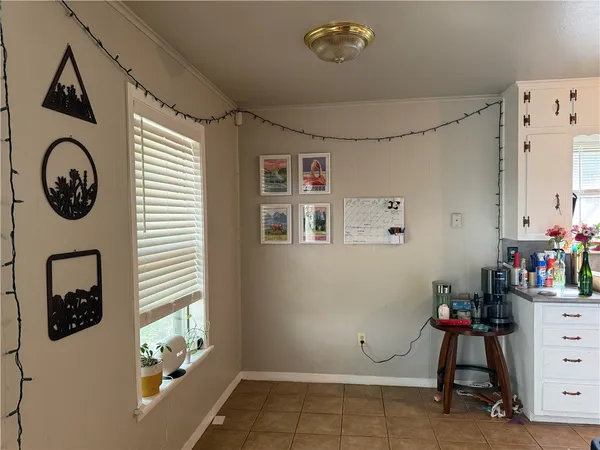 a view of livingroom with furniture and toys