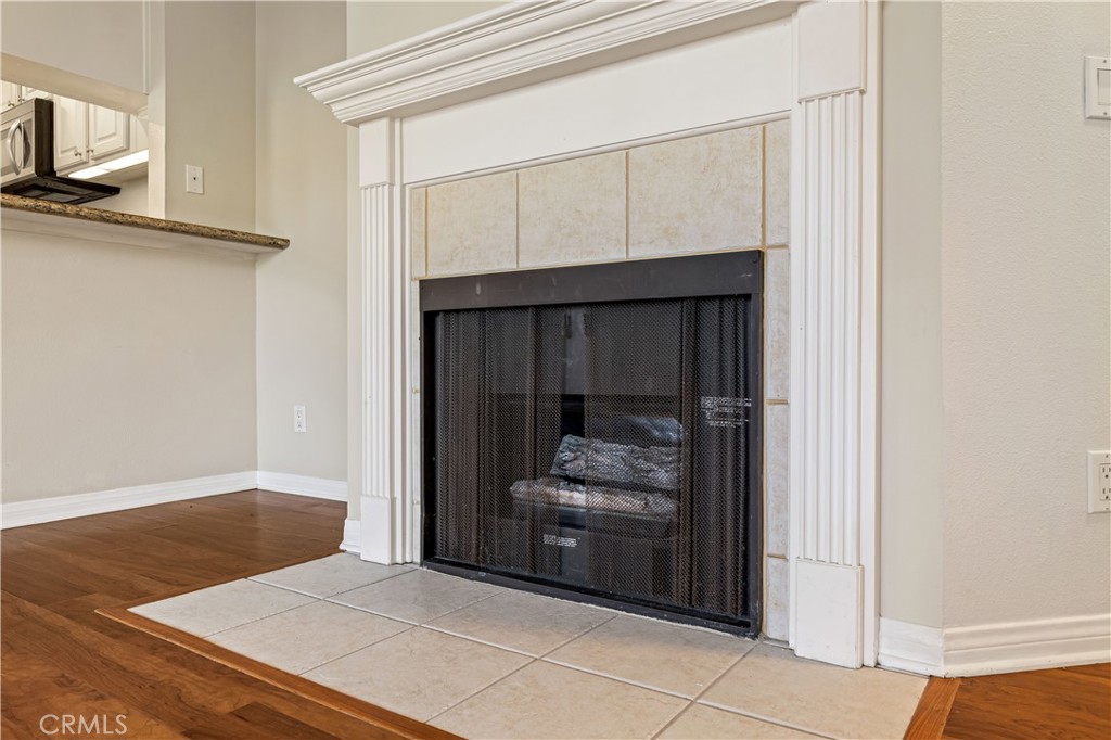 1401 North Greenbrier Road, Unit 202 Long Beach, CA 90815 - Photo 5 of 34 Living Room Fireplace