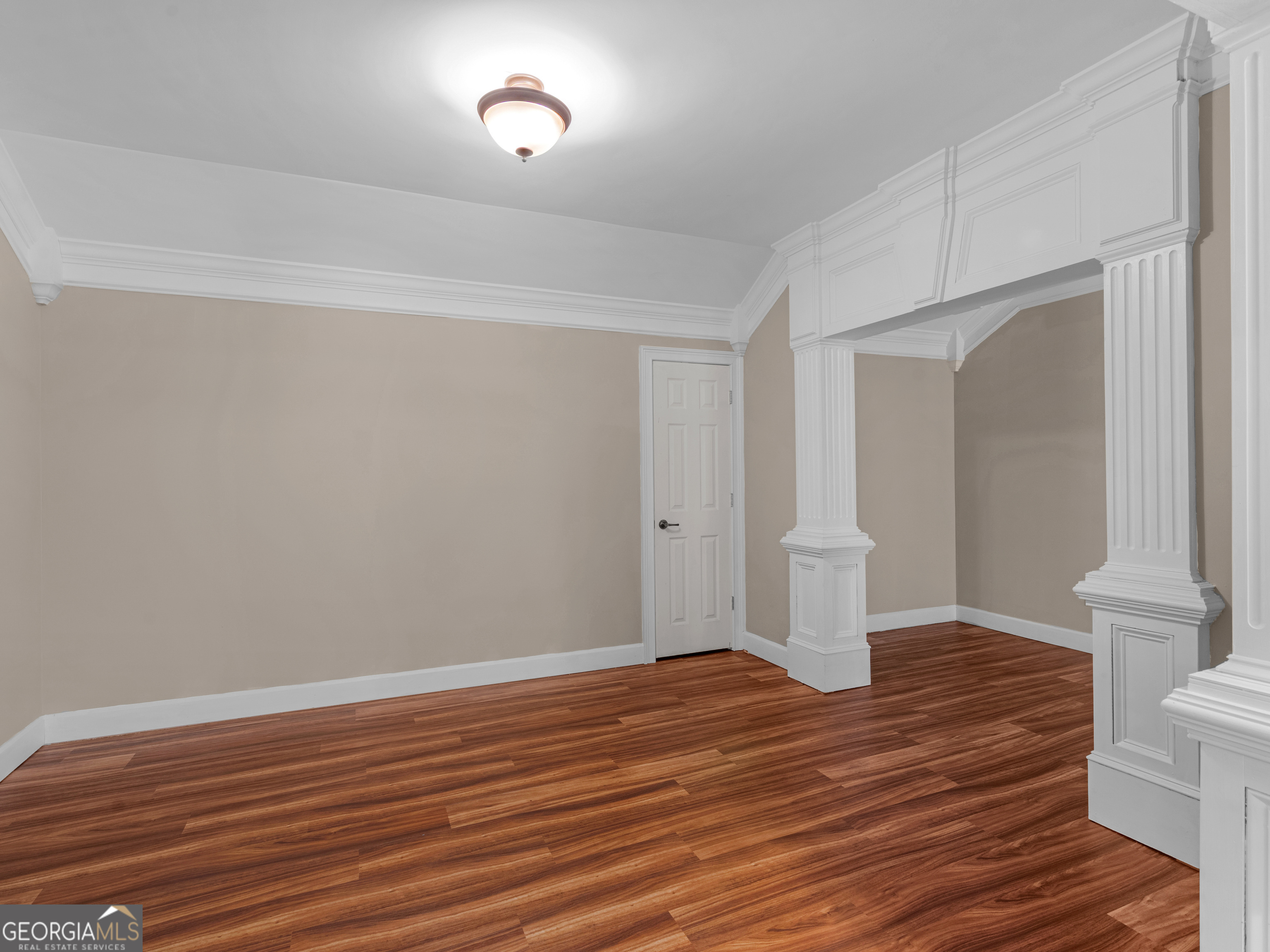 221 Hummingbird Court Hampton, GA 30228 - Photo 59 of 77 a view of an empty room with wooden floor and a window