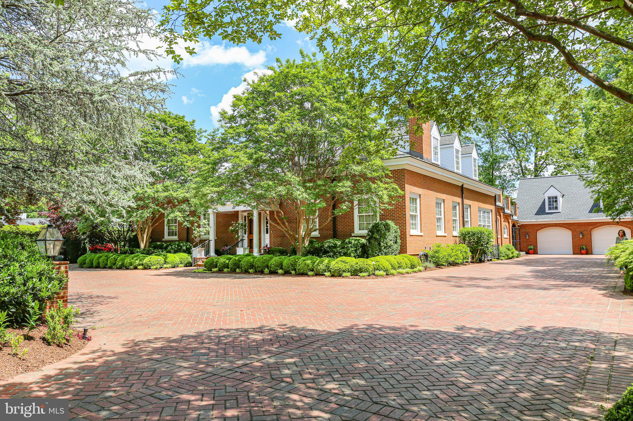1711 Highland Road Fredericksburg, VA 22401 - Photo 46 of 58 a front view of a house with a yard and garage