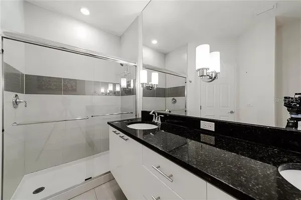 a close view of sink and mirror