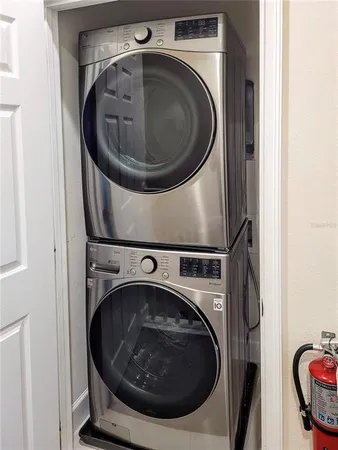a utility room with dryer and washer