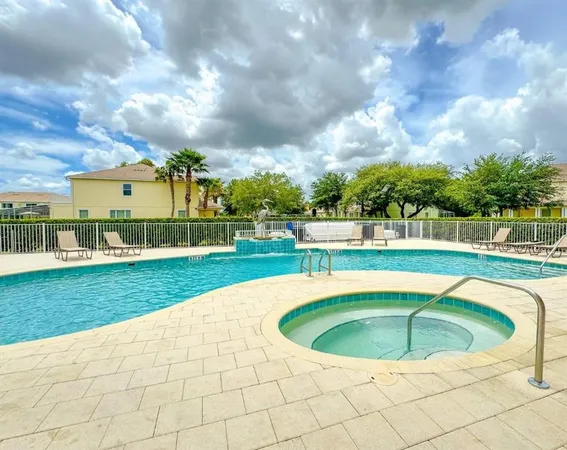 an aerial view of a tennis ground