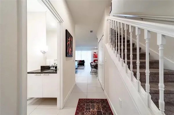 a view of a hallway view with staircase