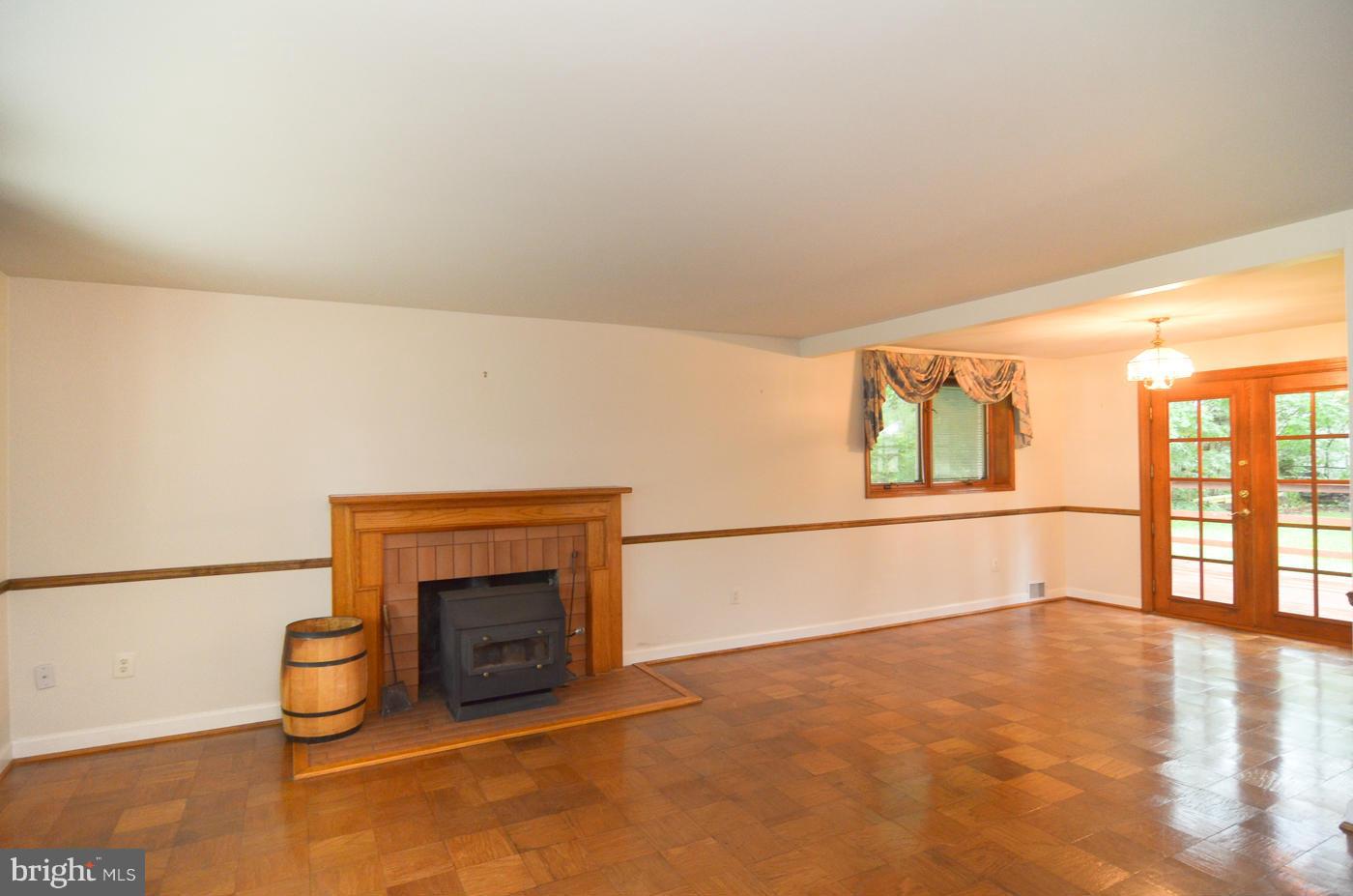 7406 Dunston Street Springfield, VA 22151 - Photo 7 of 30 Living Room w/Wood Stove