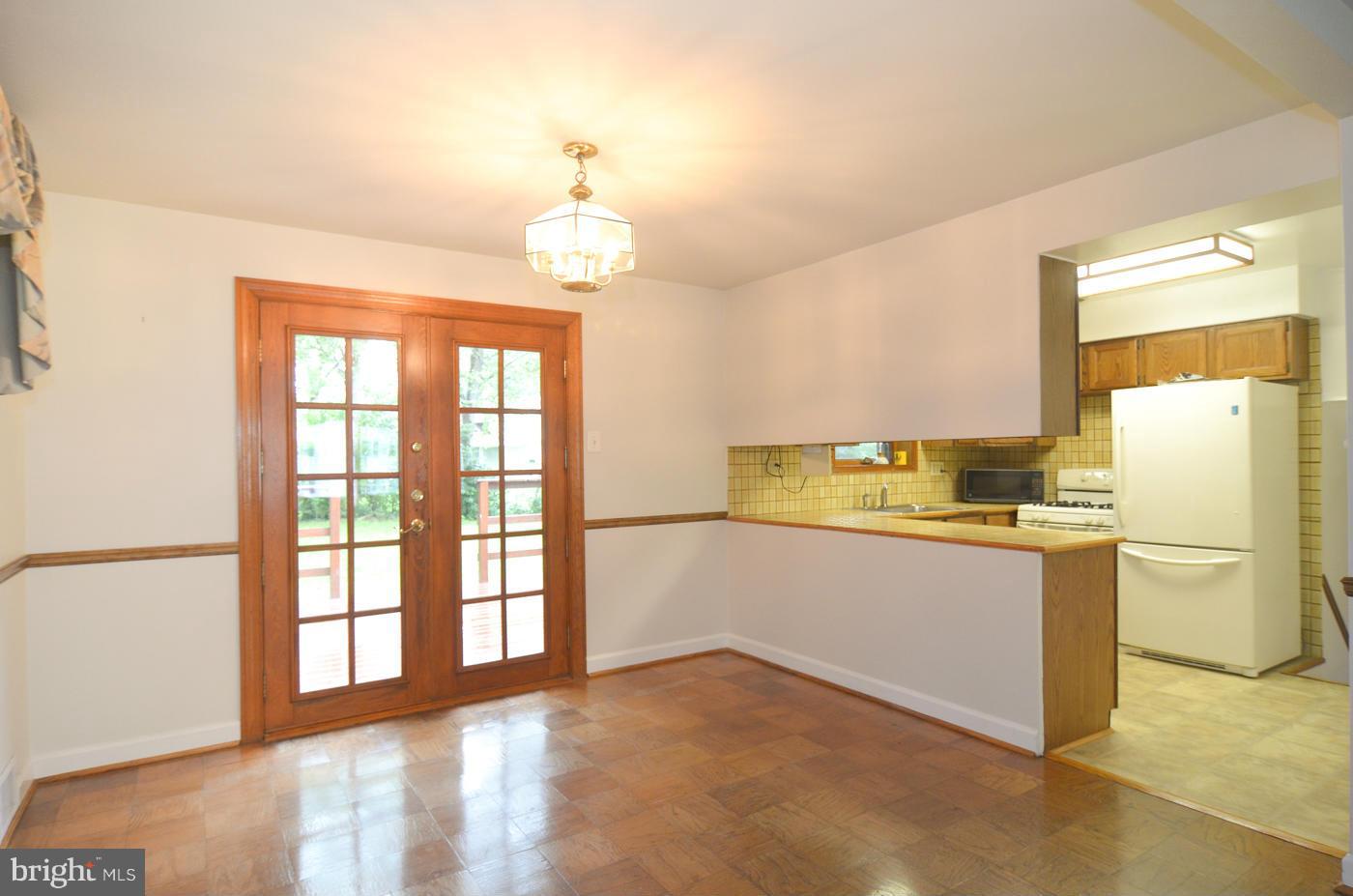 7406 Dunston Street Springfield, VA 22151 - Photo 10 of 30 Dining Room w/French Doors to Deck