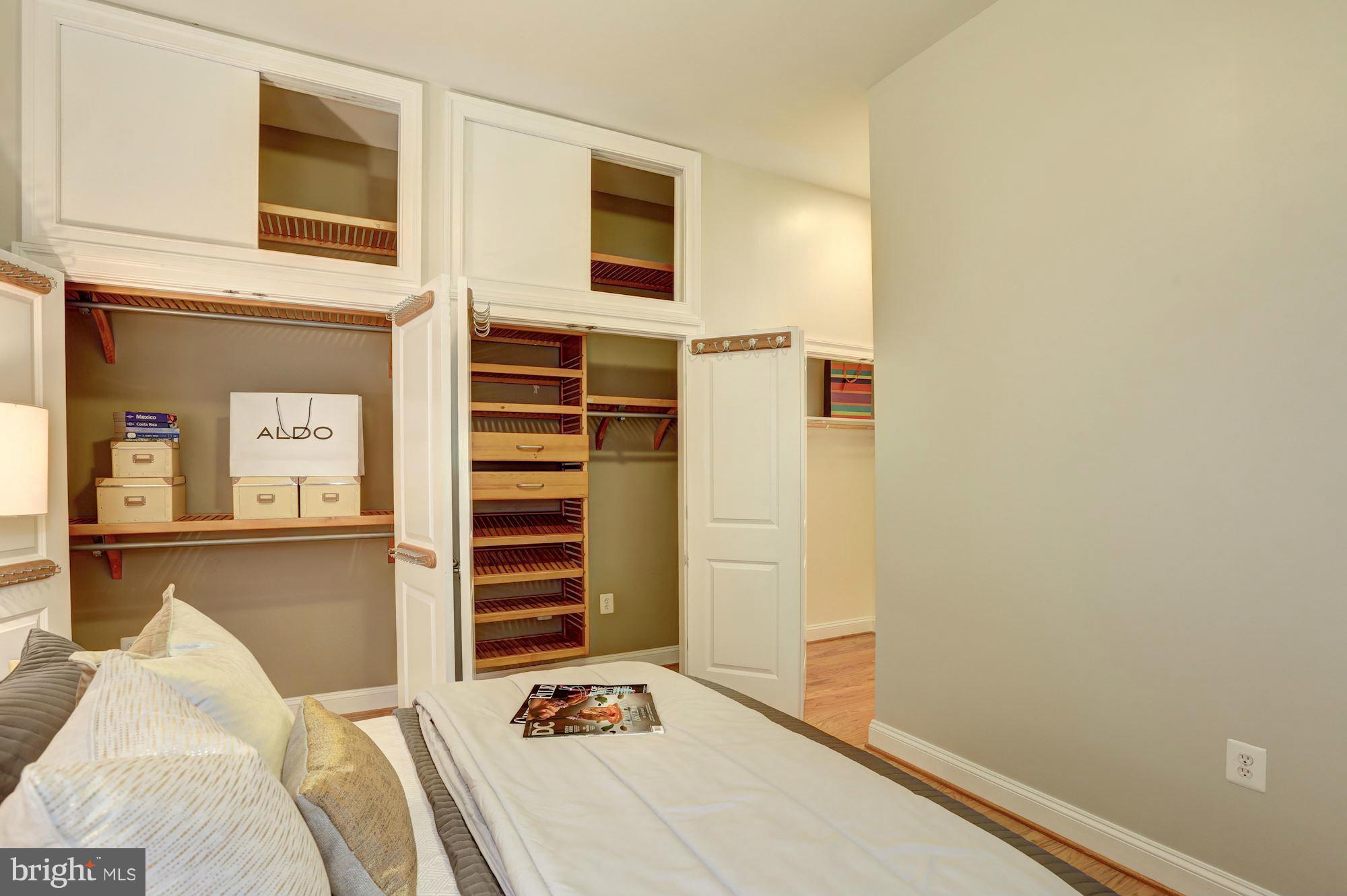 1407 W Street Northwest, Unit 202 Washington, DC 20009 - Photo 24 of 30 a bedroom with a bed and a window