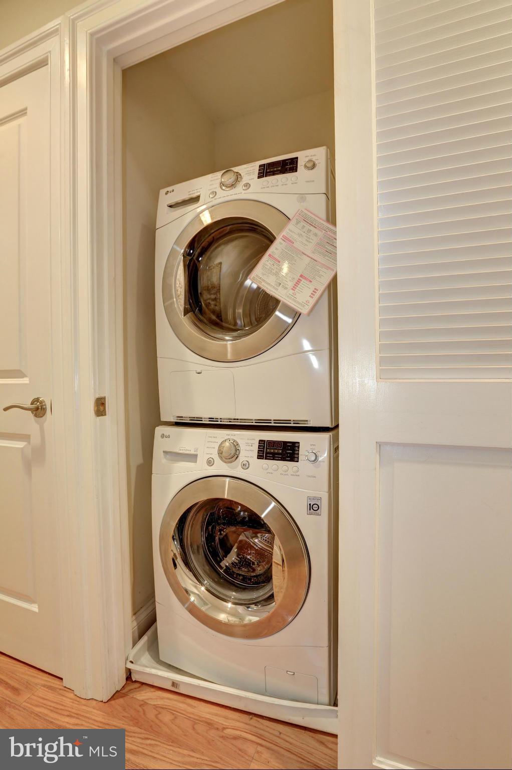 1407 W Street Northwest, Unit 202 Washington, DC 20009 - Photo 30 of 30 a utility room with dryer and washer