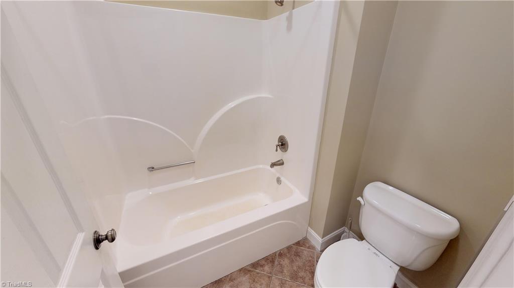 256 Stonecroft Road Mount Airy, NC 27030 - Photo 14 of 30 main level full bath with tub/shower.