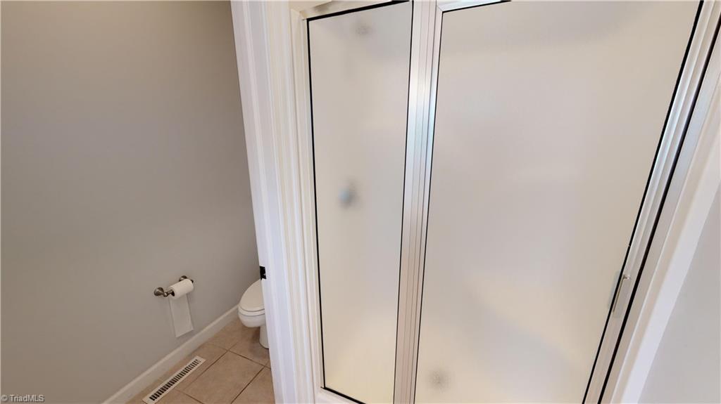 256 Stonecroft Road Mount Airy, NC 27030 - Photo 20 of 30 Separate shower and water closet in master bathroom
