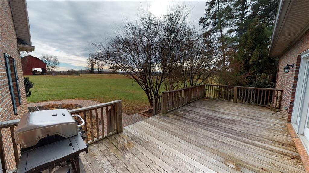 256 Stonecroft Road Mount Airy, NC 27030 - Photo 4 of 30 Back deck overlooks spacious backyard.