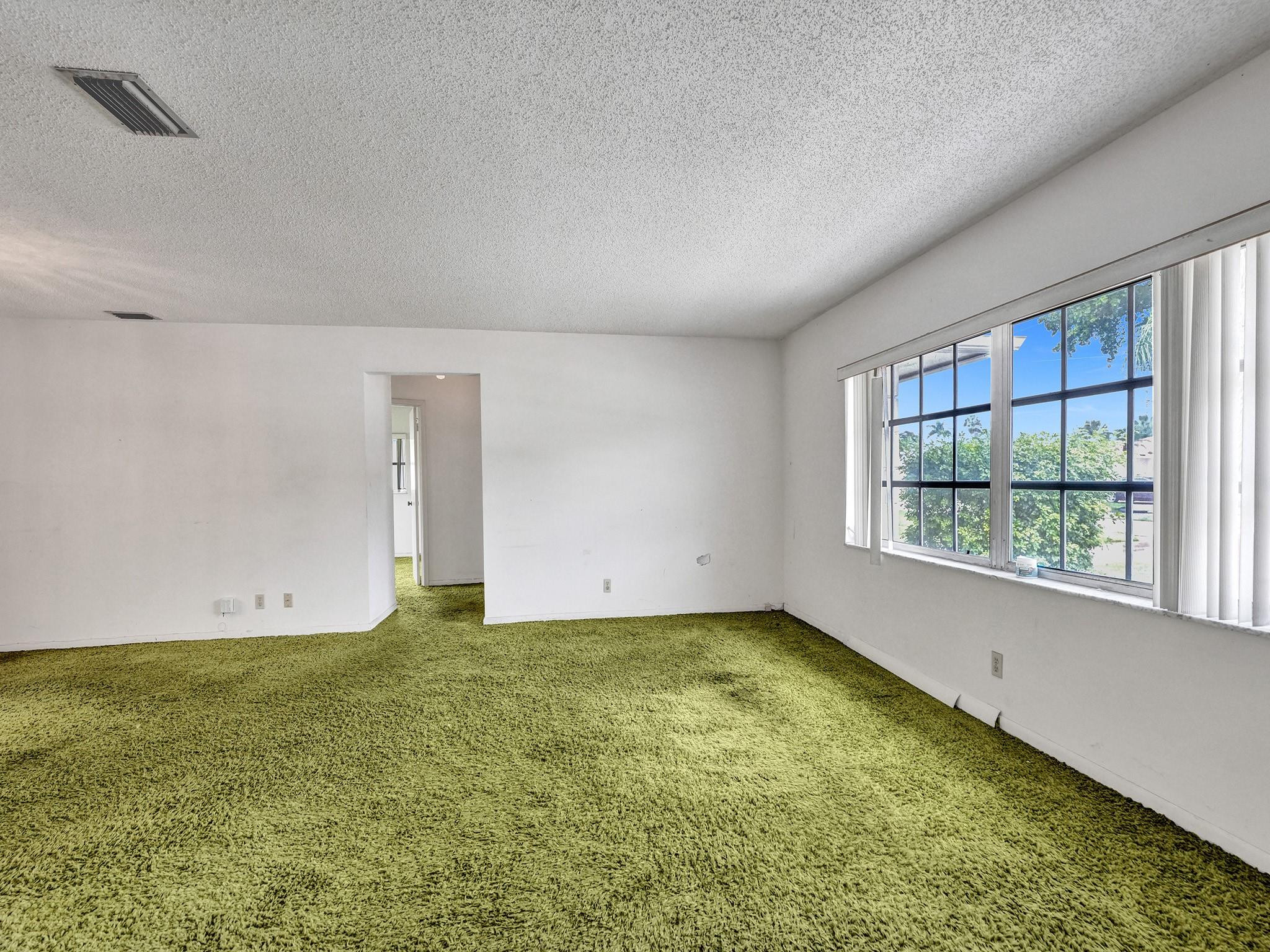 22062 Acapulco Court Boca Raton, FL 33428 - Photo 25 of 39 Living Room with entrance to Bedrooms