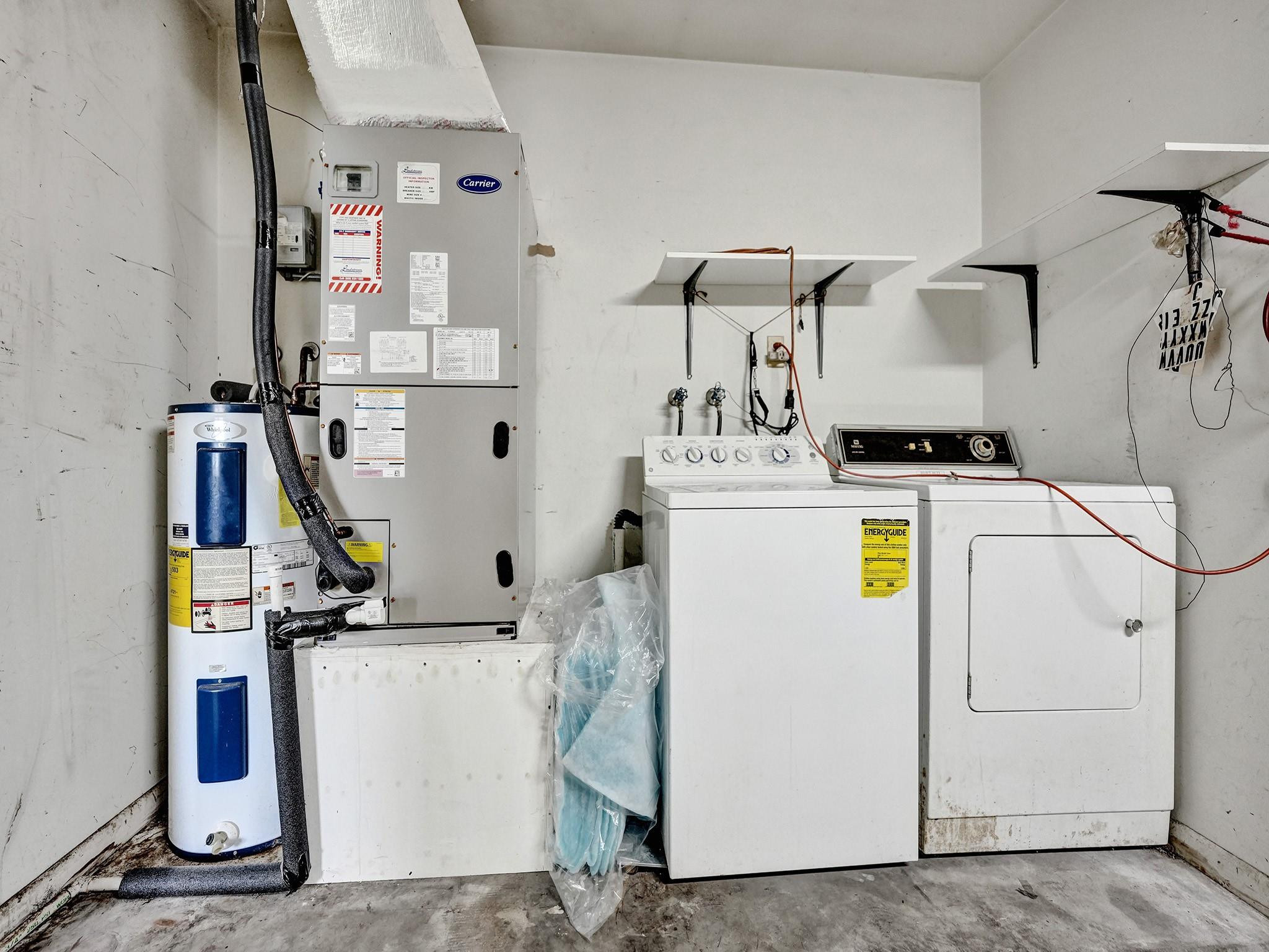 22062 Acapulco Court Boca Raton, FL 33428 - Photo 38 of 39 Washer and Dryer located in garage area.